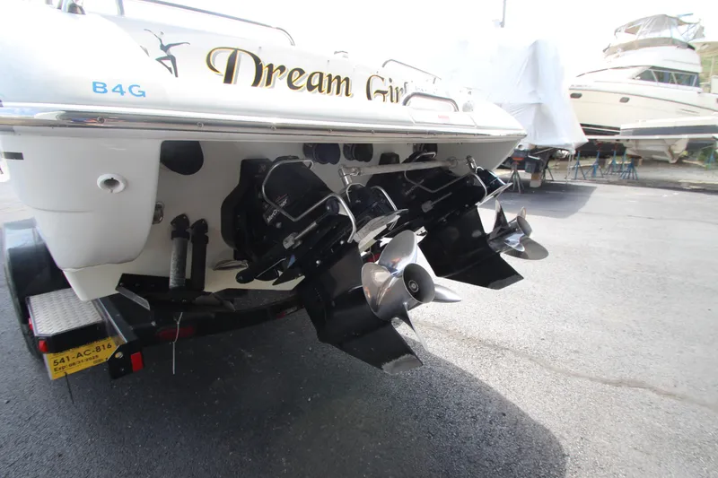 Slide: The Image of 2008 Formula 292 FASTech boat with dual propellers, named "Dream Girl," on a trailer. - 6