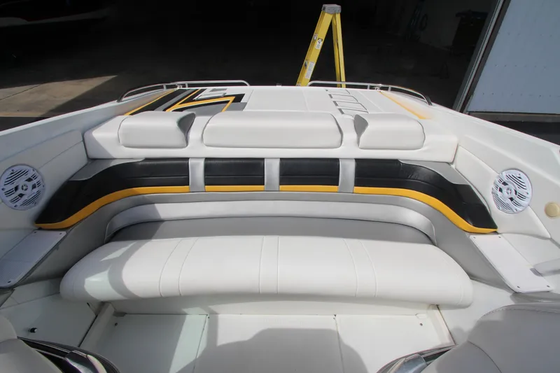 Slide: The Image of 2008 Formula 292 FASTech boat interior with white, black, and yellow seating. - 8