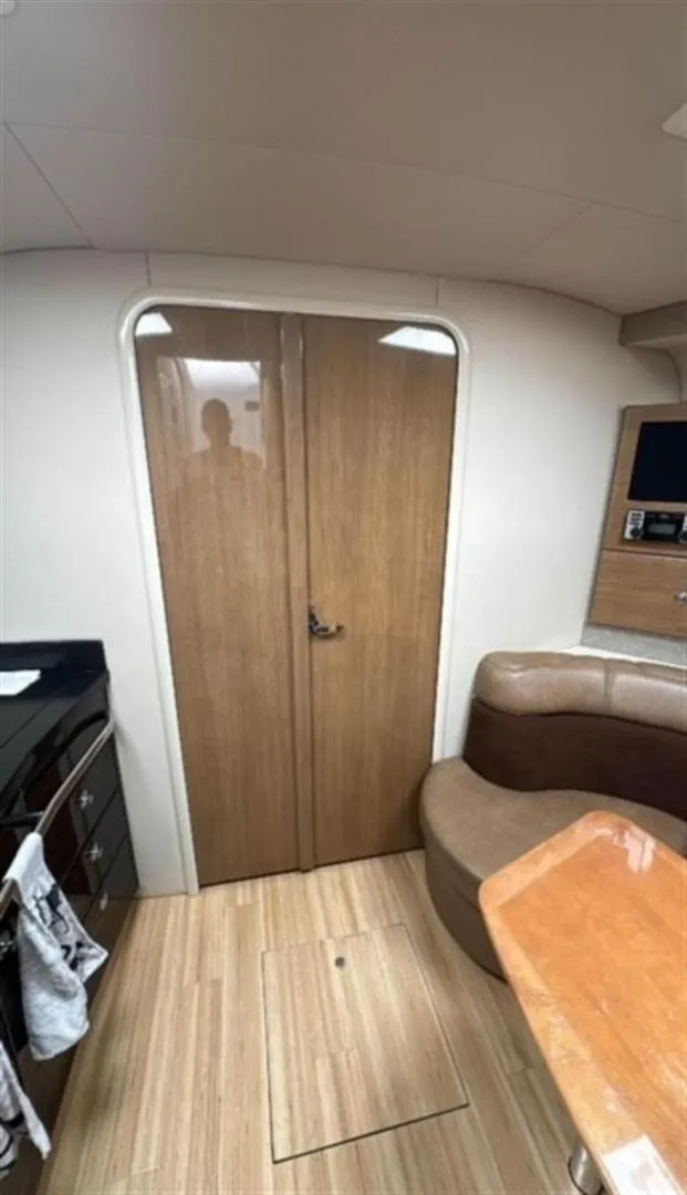 Slide: The Image of Interior of 2013 Formula 37 PC yacht with wood finish and seating area. - 10