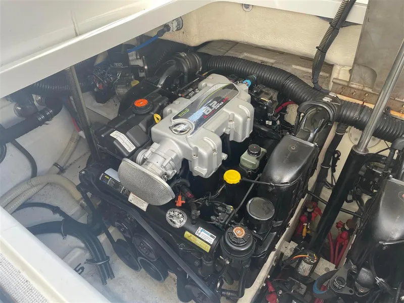 Slide: The Image of Engine compartment of a 2013 Formula 37 PC boat, showcasing detailed mechanical components. - 16