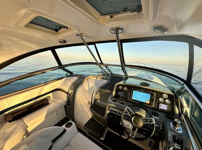 Slide: The Image of Interior of 2013 Formula 37 PC yacht with modern dashboard and ocean view. - 5