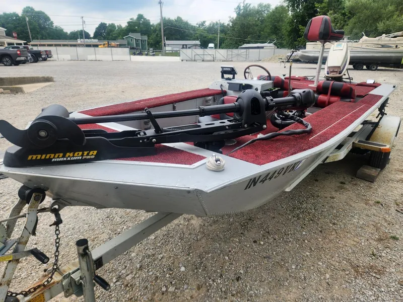 Slide: The Image of 1987 Sea Nymph Traveler boat with Minn Kota trolling motor on trailer. - 7