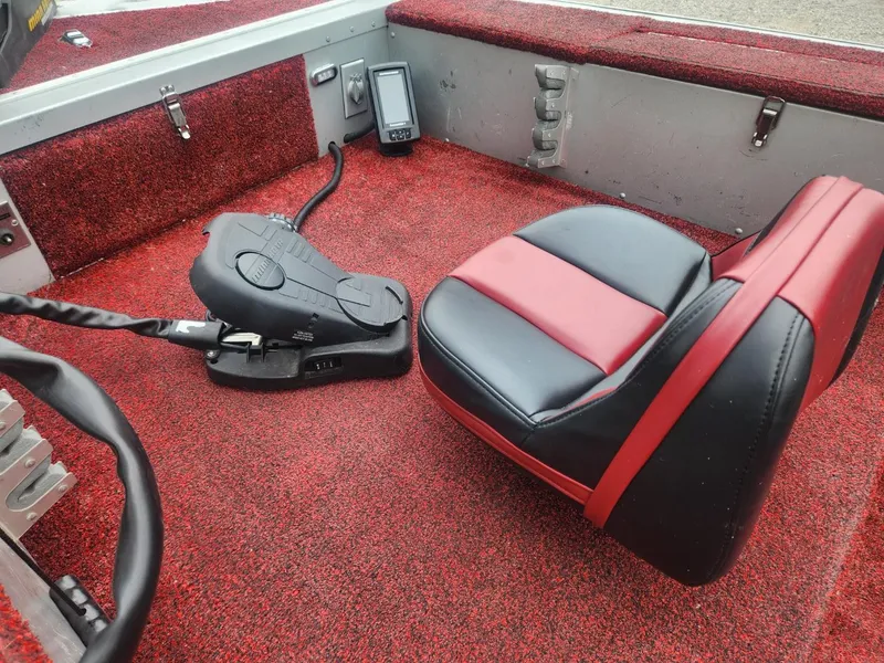 Slide: The Image of Red and black boat interior with seat and control panel, Sea Nymph Traveler 1987. - 9