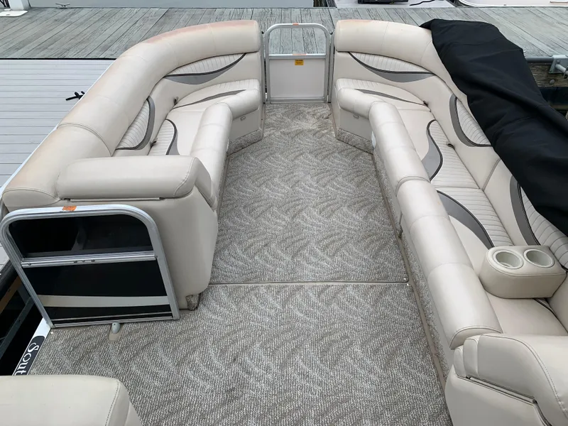 Slide: The Image of Luxurious seating on a 2009 South Bay 825 CR pontoon boat with elegant upholstery. - 1