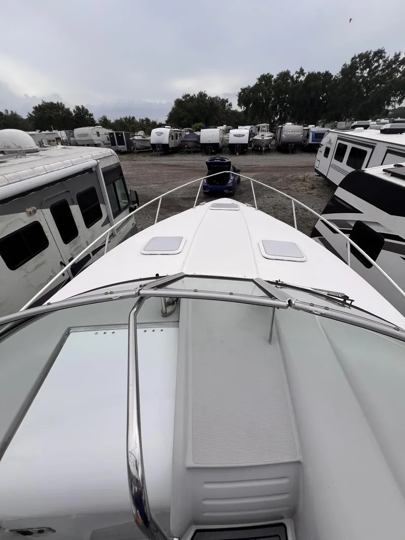 Slide: The Image of 2006 Formula 27 PC boat in storage lot with RVs and trailers. - 10