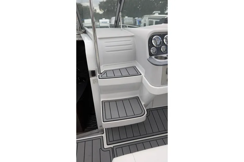 Slide: The Image of Interior steps of a 2006 Formula 27 Performance Cruiser with sleek design and modern dashboard. - 18