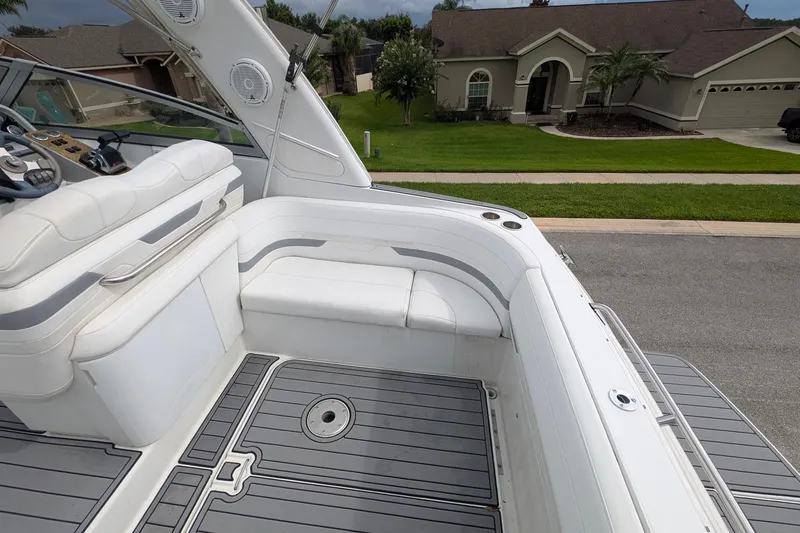 Slide: The Image of 2006 Formula 27 Performance Cruiser interior with white seating and modern dashboard. - 19