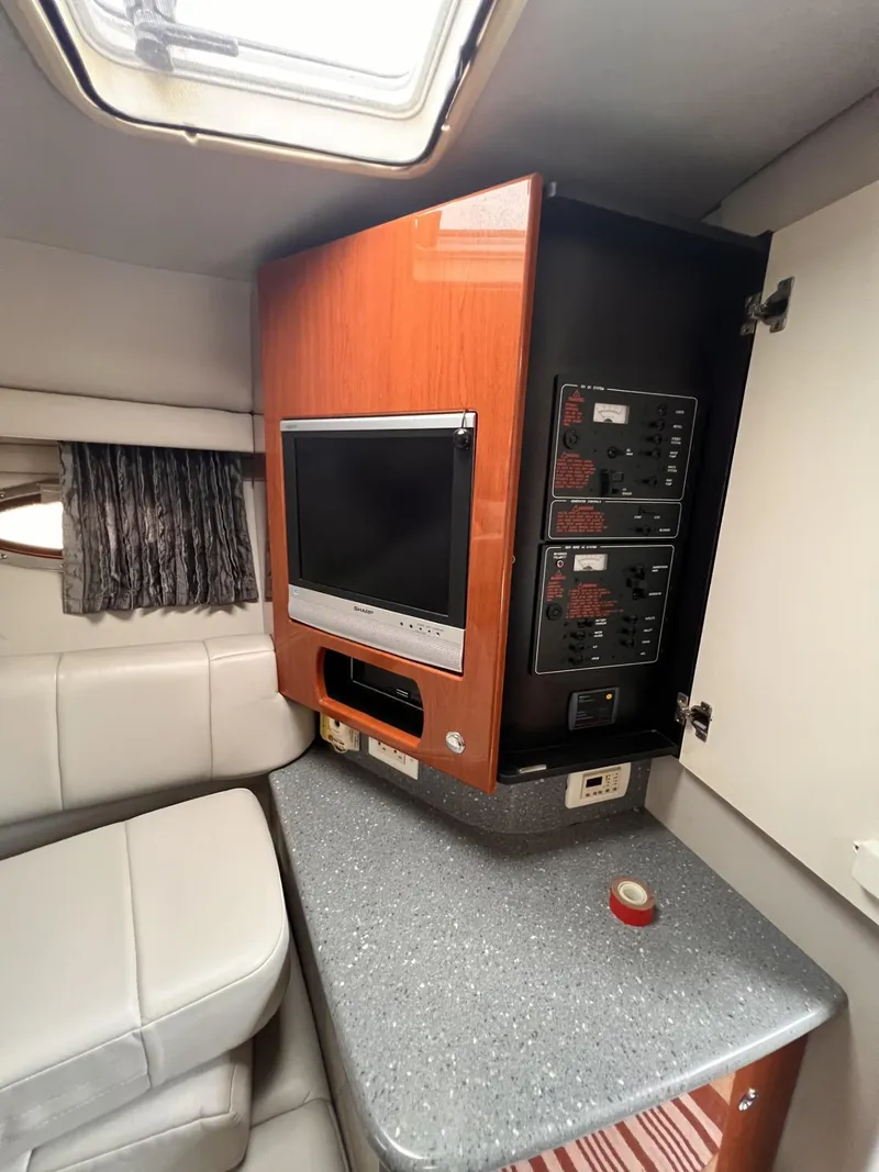 Slide: The Image of 2006 Formula 27 PC cabin interior with TV and control panels. - 31