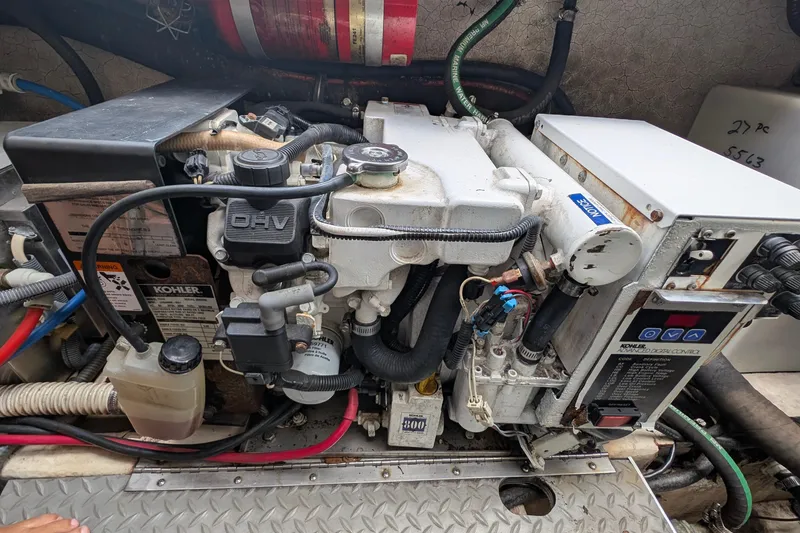 Slide: The Image of Engine compartment of a 2006 Formula 27 Performance Cruiser with Kohler generator. - 35