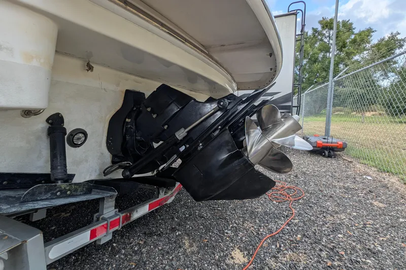 Slide: The Image of 2006 Formula 27 Performance Cruiser boat propeller and stern drive on trailer. - 48