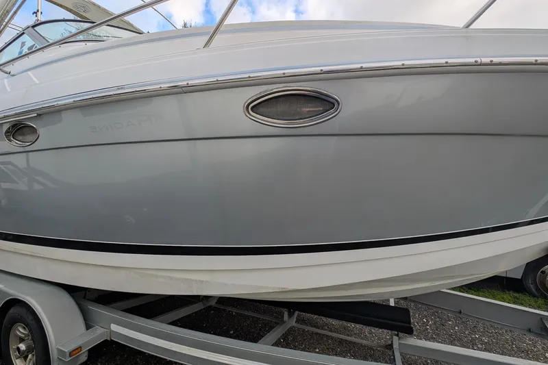 Slide: The Image of 2006 Formula 27 Performance Cruiser on trailer, side view, sleek design. - 8