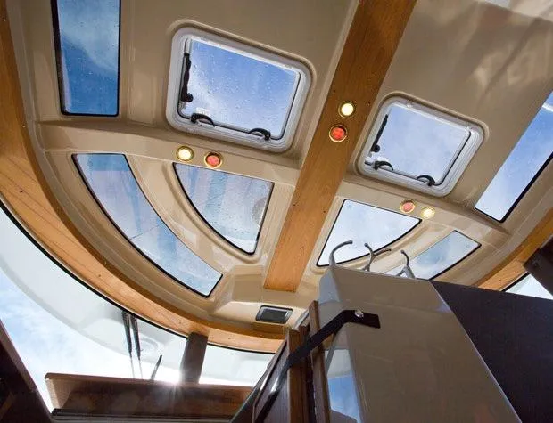 Slide: The Image of Manufacturer Provided Image: Interior view of 2016 Ranger Tugs R-29S skylights and wooden trim. - 27