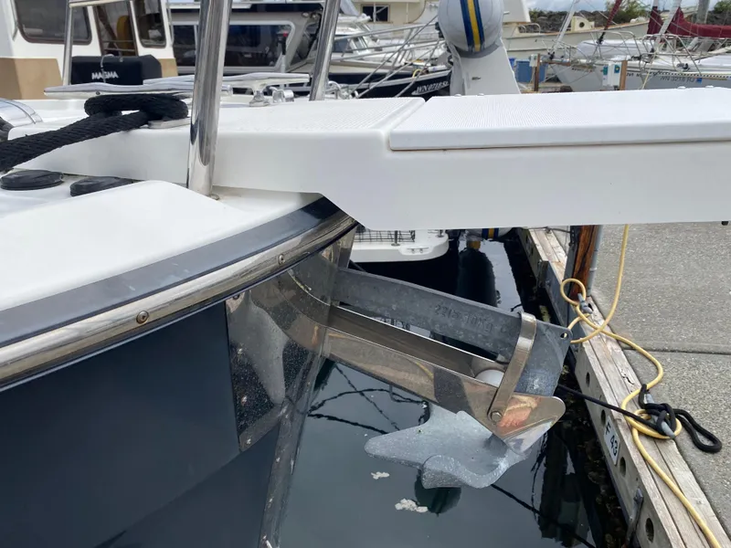 Slide: The Image of 2016 Ranger Tugs R-29S boat with anchor at marina dock. - 7
