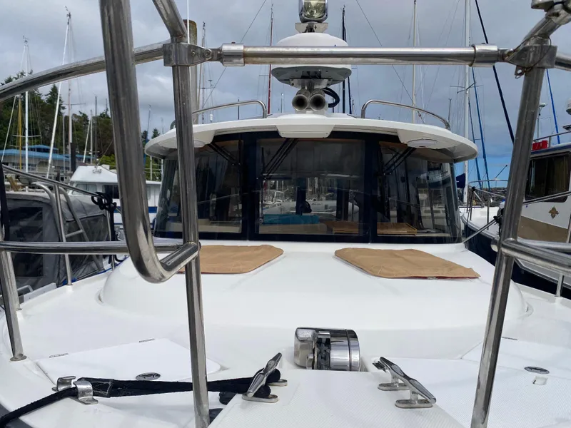 Slide: The Image of 2016 Ranger Tugs R-29S boat docked at marina, featuring sleek design and modern equipment. - 8