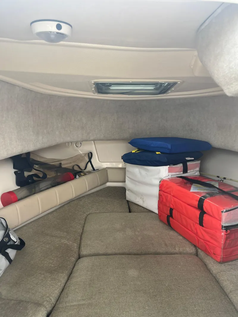 Slide: The Image of Interior cabin of 2013 Grady-White 22 Seafarer with storage and cushions. - 19