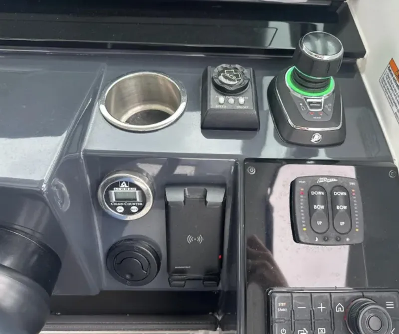 Slide: The Image of Control panel of 2021 Formula 400 Super Sport Crossover boat with joystick and chain counter. - 19