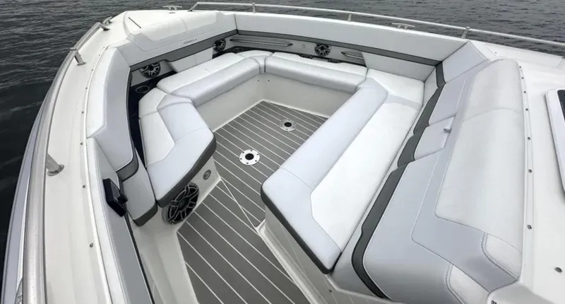 Slide: The Image of 2021 Formula 400 Super Sport Crossover boat with spacious white seating and sleek design. - 24