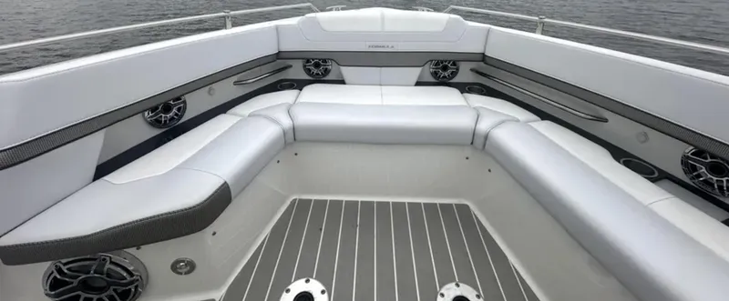 Slide: The Image of 2021 Formula 400 Super Sport Crossover boat interior with sleek seating and modern design. - 25