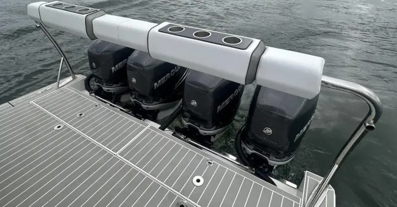 Slide: The Image of 2021 Formula 400 Super Sport Crossover with four powerful Mercury outboard engines on water. - 6