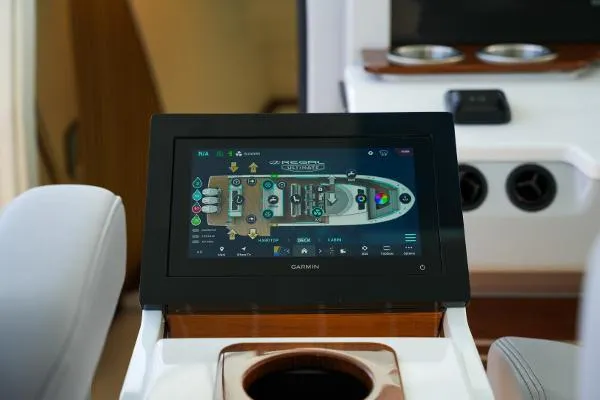 Slide: The Image of Touchscreen control panel on 2026 Regal 50 SAV yacht dashboard. - 16