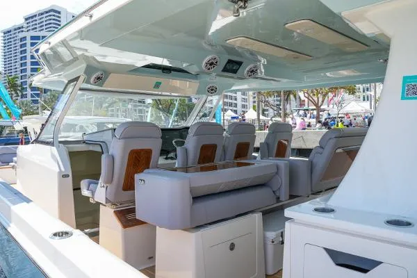 Slide: The Image of 2026 Regal 50 SAV luxury yacht interior with modern seating and sleek design. - 24