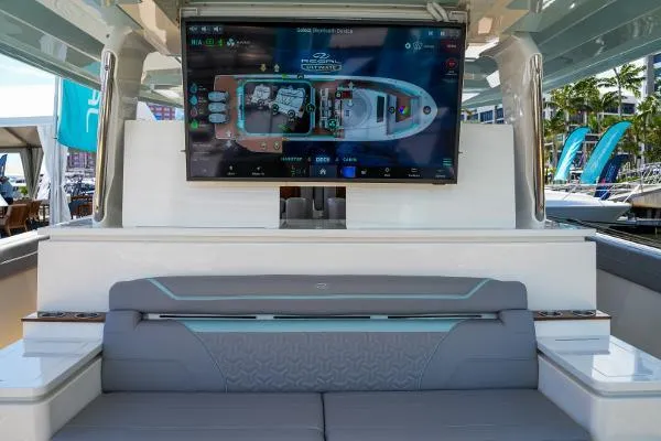 Slide: The Image of Luxurious 2026 Regal 50 SAV yacht interior with advanced navigation display. - 26