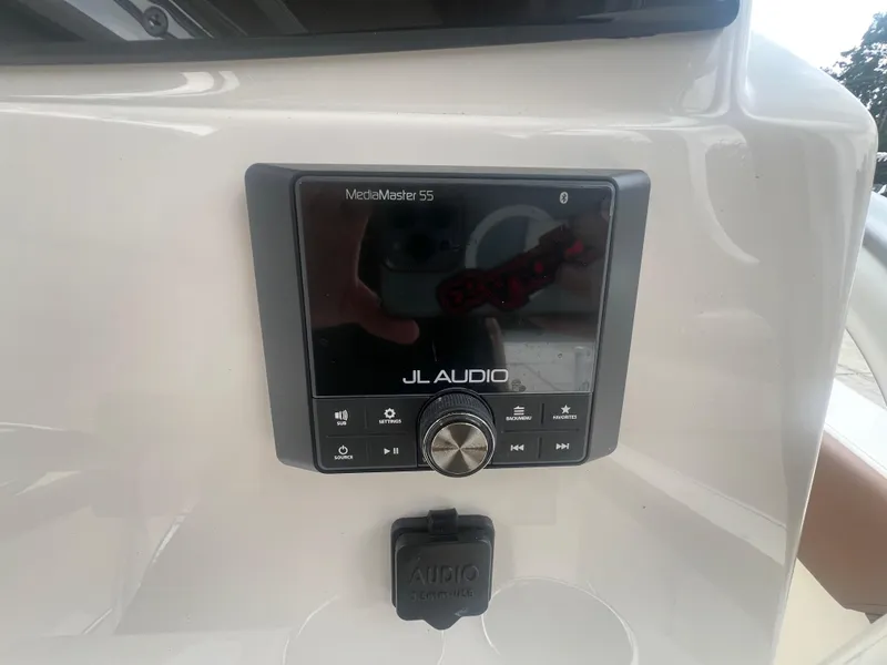 Slide: The Image of JL Audio MediaMaster 55 on 2026 Pioneer 202 Islander boat dashboard. - 11