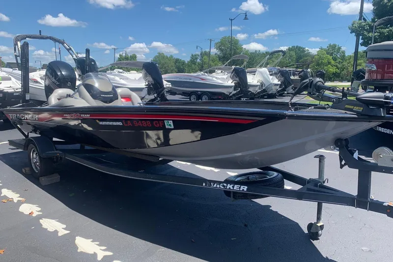 Slide: The Image of 2017 Tracker Pro Team 190 TX boat on trailer in sunny outdoor setting. - 3