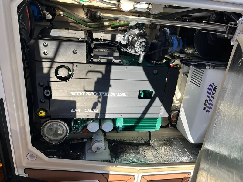 Slide: The Image of Engine compartment of 2025 Ranger Tugs R-29 CB with Volvo Penta D4-320 engine. - 21