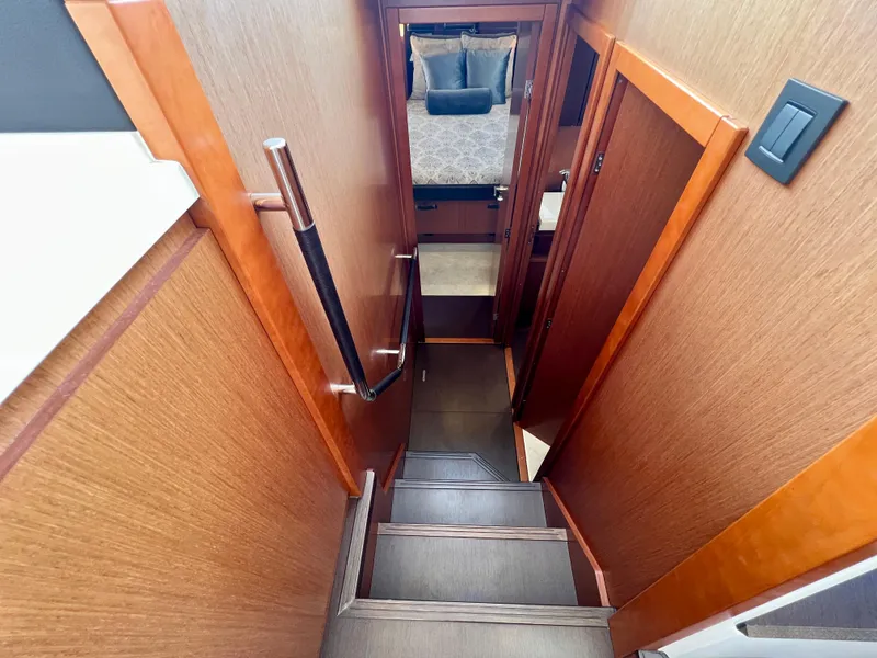 Slide: The Image of Staircase leading to cabin interior of 2017 Jeanneau Velasco 43 yacht. - 12