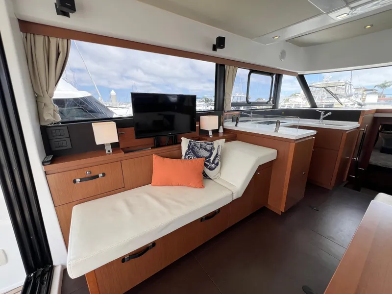 Slide: The Image of Interior of 2017 Jeanneau Velasco 43 yacht with modern seating and decor. - 8