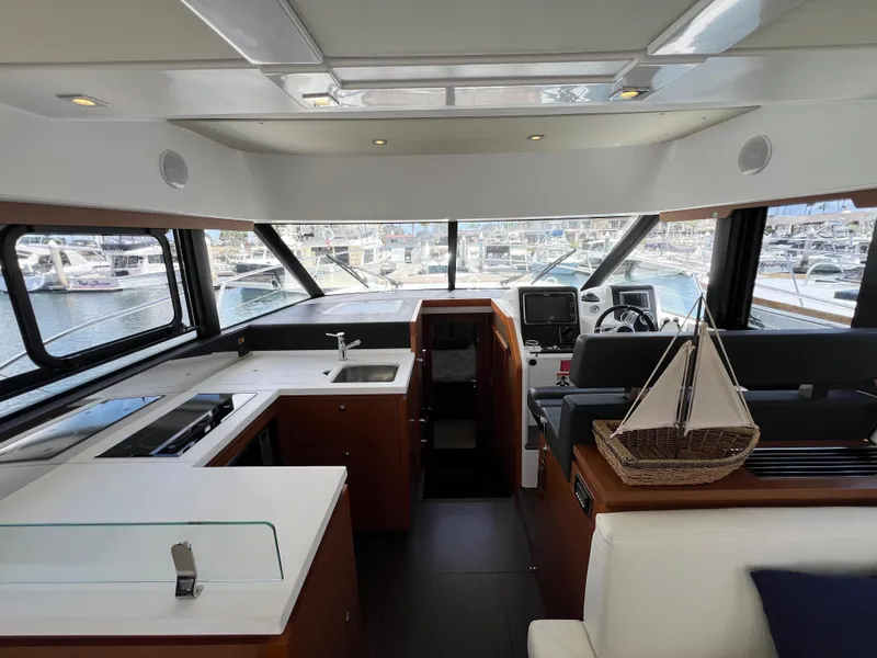 Slide: The Image of Interior of 2017 Jeanneau Velasco 43 yacht with modern kitchen and helm station. - 9