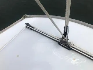 Slide: The Image of Close-up of a 1999 Alerion 26 sailboat deck with rigging details. - 8