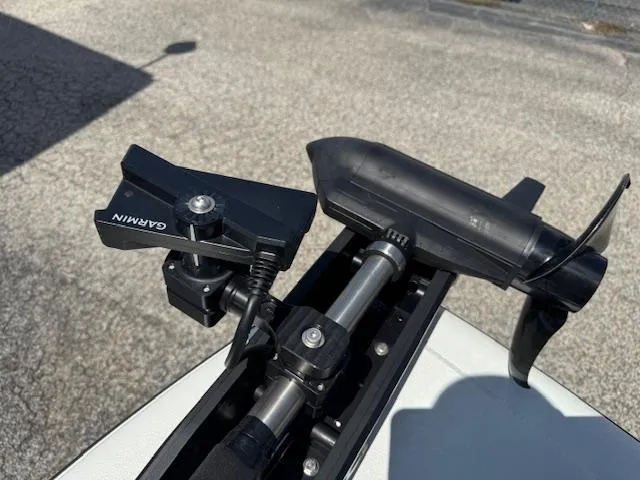 Slide: The Image of Avid 23 Mag 2025 boat equipment featuring Garmin technology on a sunny day. - 13