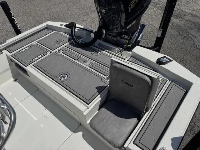 Slide: The Image of Avid 23 Mag 2025 boat deck with seating and storage compartments. - 17