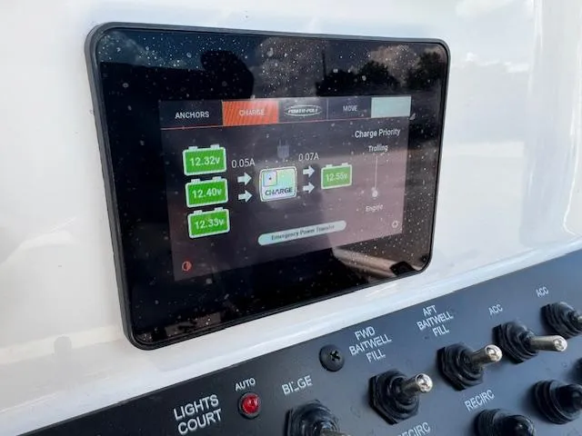 Slide: The Image of Touchscreen control panel on Avid 23 Mag 2025 boat, displaying battery charge status. - 9