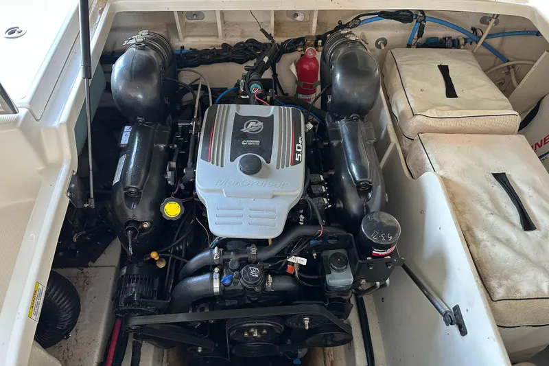Slide: The Image of Engine compartment of a 2010 Sea Ray 240 Sundeck with MerCruiser 5.0L engine. - 30