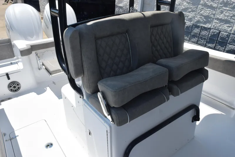 Slide: The Image of 2026 Sea Hunt Gamefish 30 Forward Seating with cushioned seats and dual outboard motors. - 11