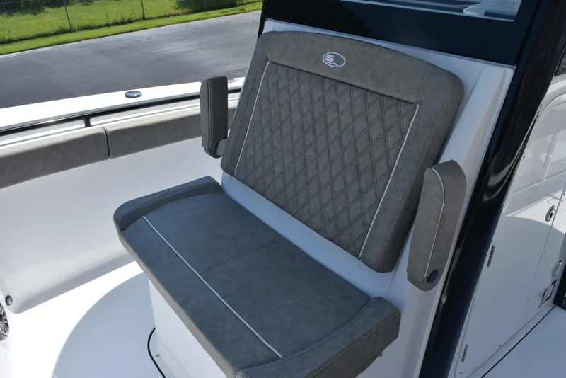Slide: The Image of 2026 Sea Hunt Gamefish 30 Forward Seating with gray cushioned seat and armrests. - 13