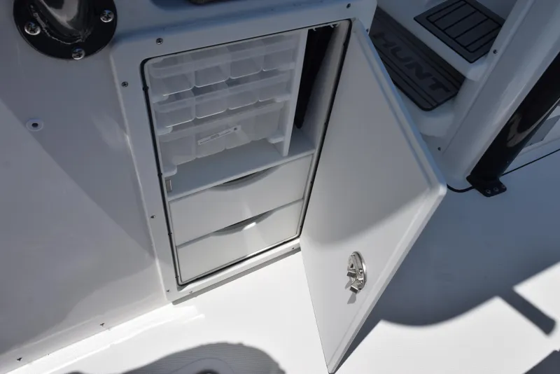 Slide: The Image of Open storage compartment on 2026 Sea Hunt Gamefish 30 boat. - 25