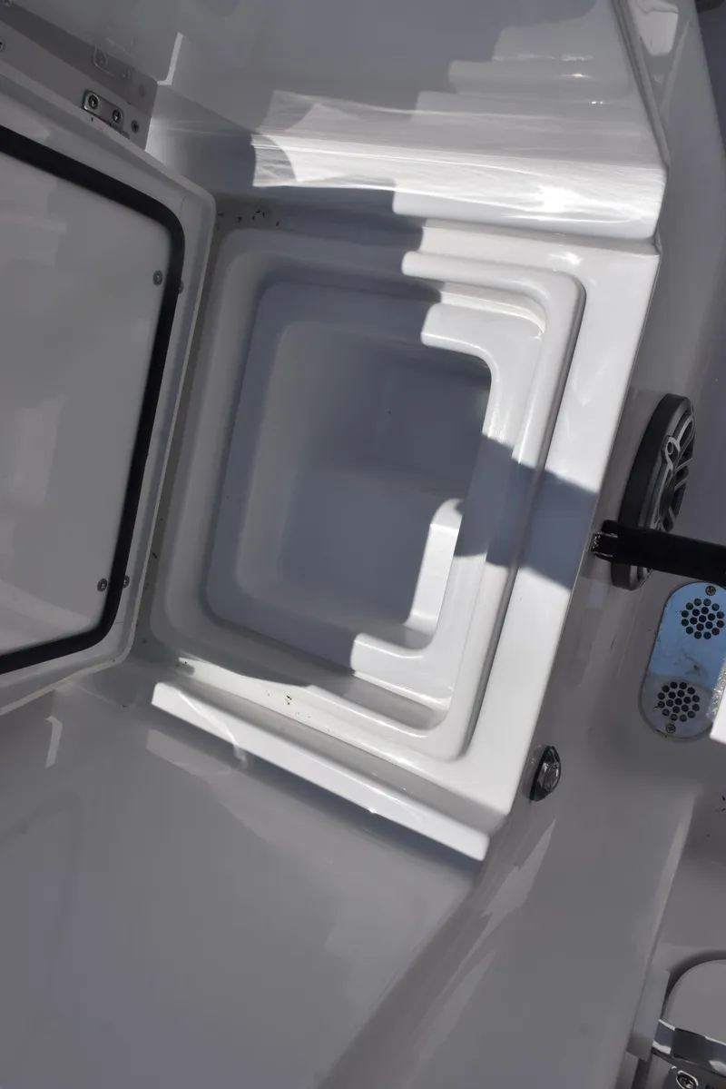 Slide: The Image of Open storage compartment on 2026 Sea Hunt Gamefish 30 Forward Seating boat. - 26