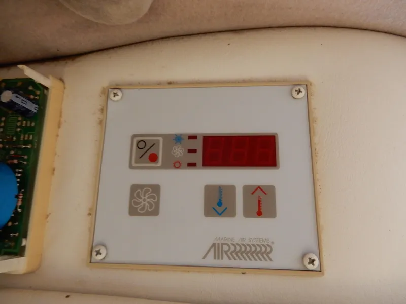 Slide: The Image of Control panel of Marine Air Systems in a 2003 Cobalt 293 boat. - 15