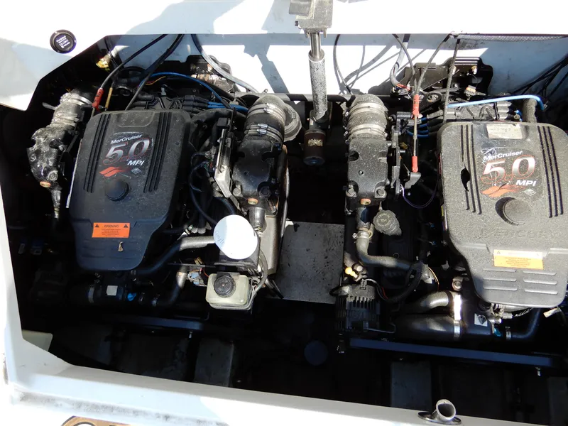 Slide: The Image of Twin MerCruiser 5.0 MPI engines in a 2003 Cobalt 293 boat engine compartment. - 17