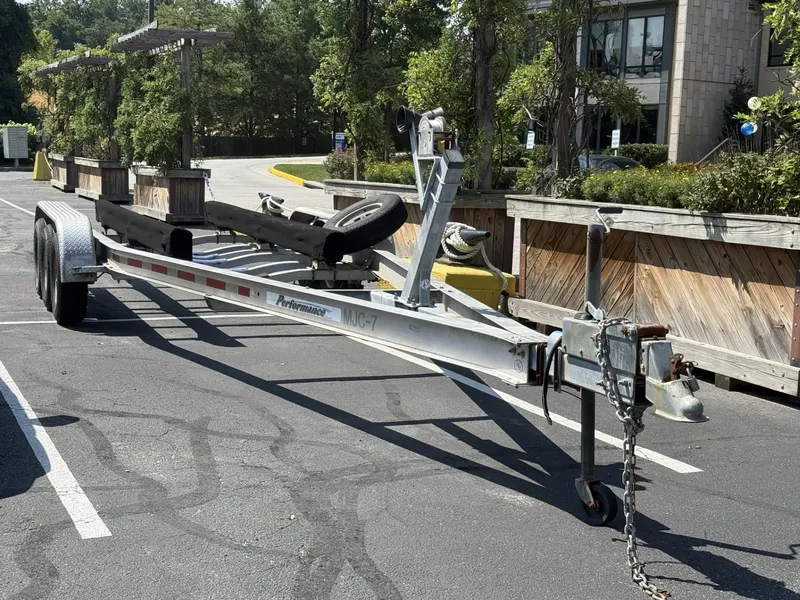 Slide: The Image of Boat trailer parked in lot, designed for 2003 Cobalt 293 model. - 20
