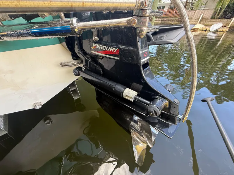 Slide: The Image of 1988 Wellcraft Scarab 38 KV boat with Mercury Bravo One XZ outdrive in water. - 10