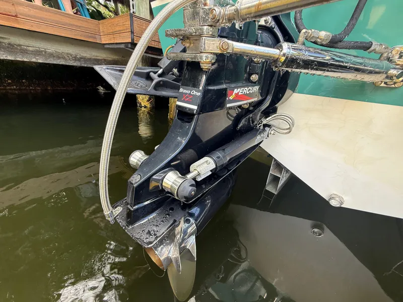 Slide: The Image of 1988 Wellcraft Scarab 38 KV boat with Mercury Bravo One XZ outdrive in water. - 12