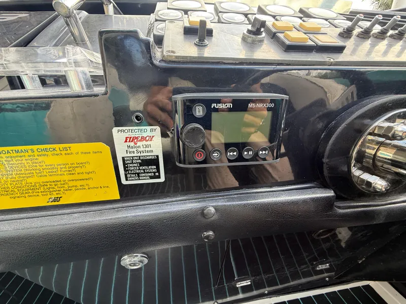 Slide: The Image of Control panel of a 1988 Wellcraft Scarab 38 KV boat with Fusion MS-NRX300 system. - 29