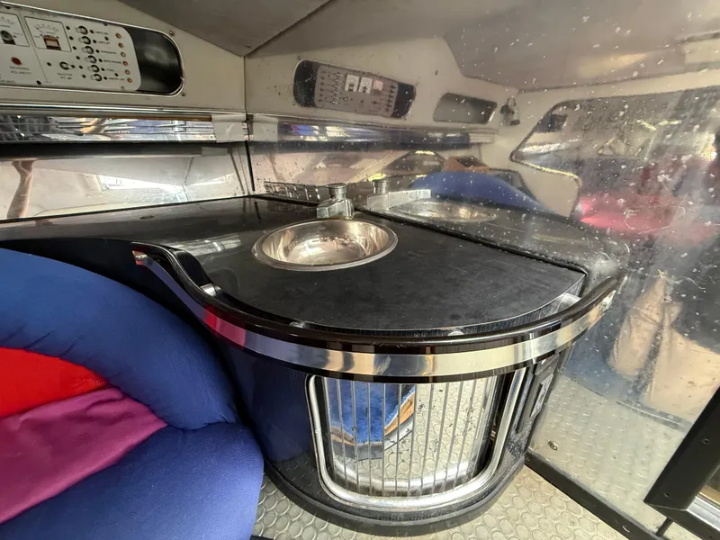 Slide: The Image of Interior of 1988 Wellcraft Scarab 38 KV boat with sink and control panel. - 39