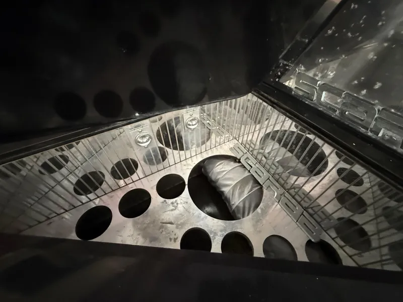 Slide: The Image of Interior view of 1988 Wellcraft Scarab 38 KV boat, showcasing metallic design elements. - 43