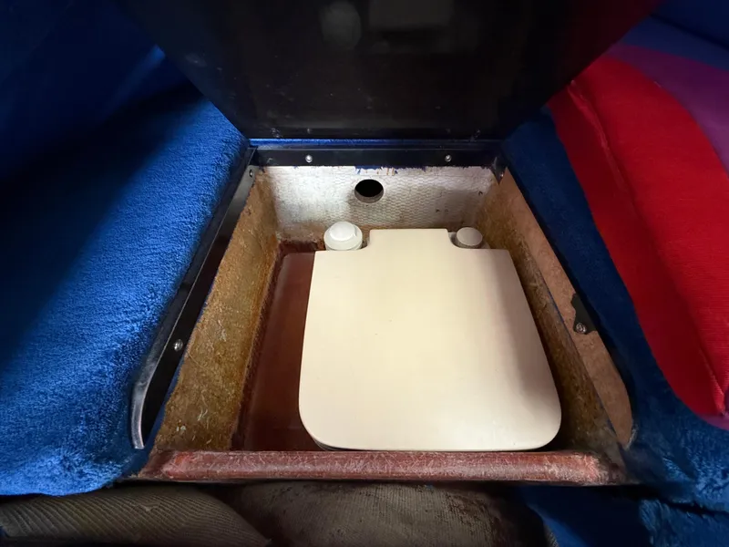 Slide: The Image of Storage compartment in 1988 Wellcraft Scarab 38 KV boat interior. - 48